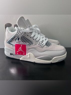 Jordan White and Light Gray Retro 4 with Pink Jumpman Tag